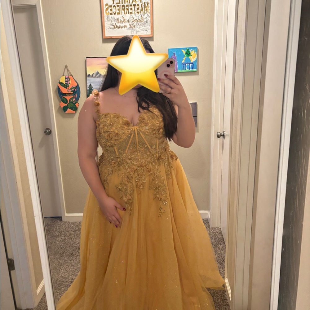 Elegant Gold Gown with Floral Details